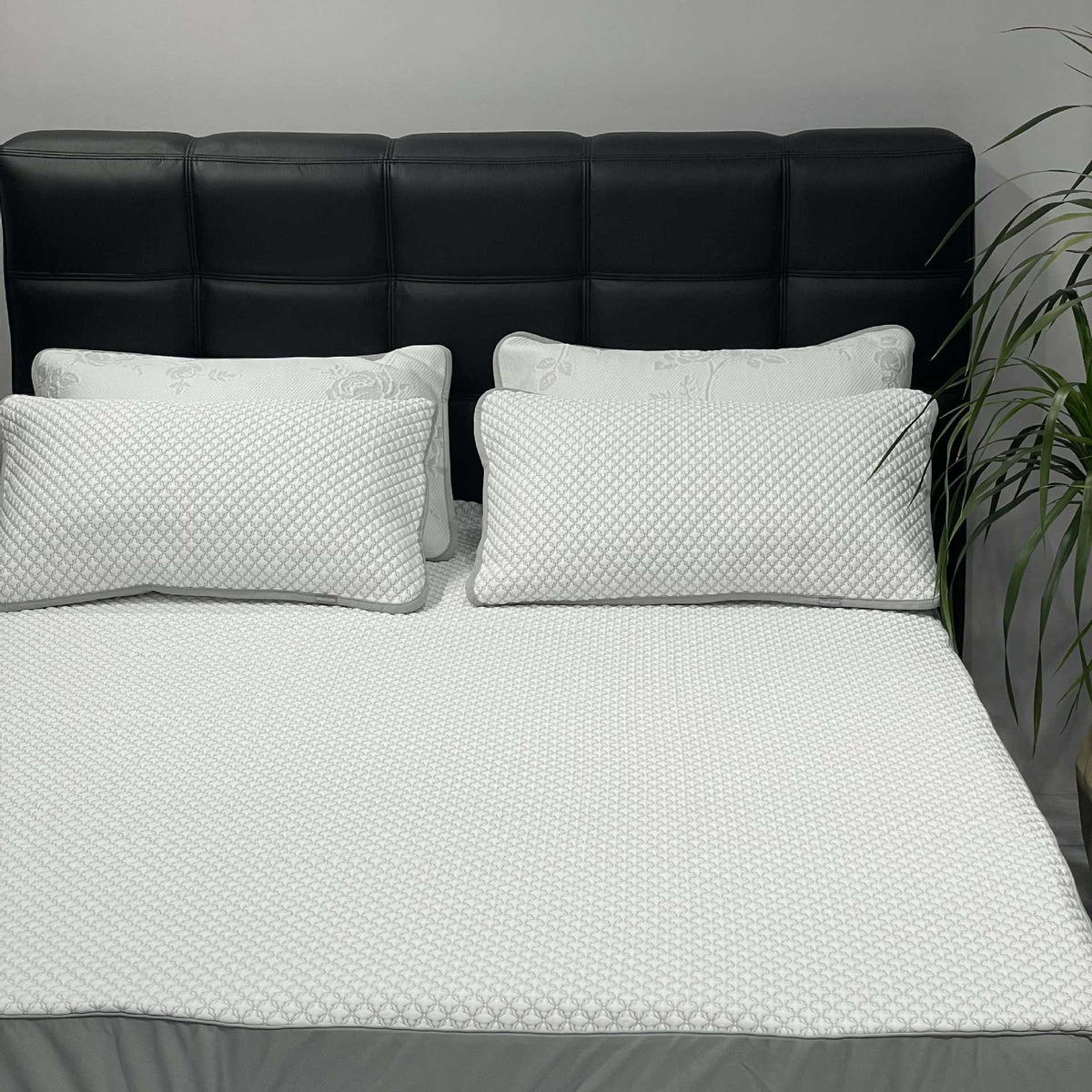 Quilted cotton bedspread set with honeycomb quilting, lace trim, and matching pillow covers