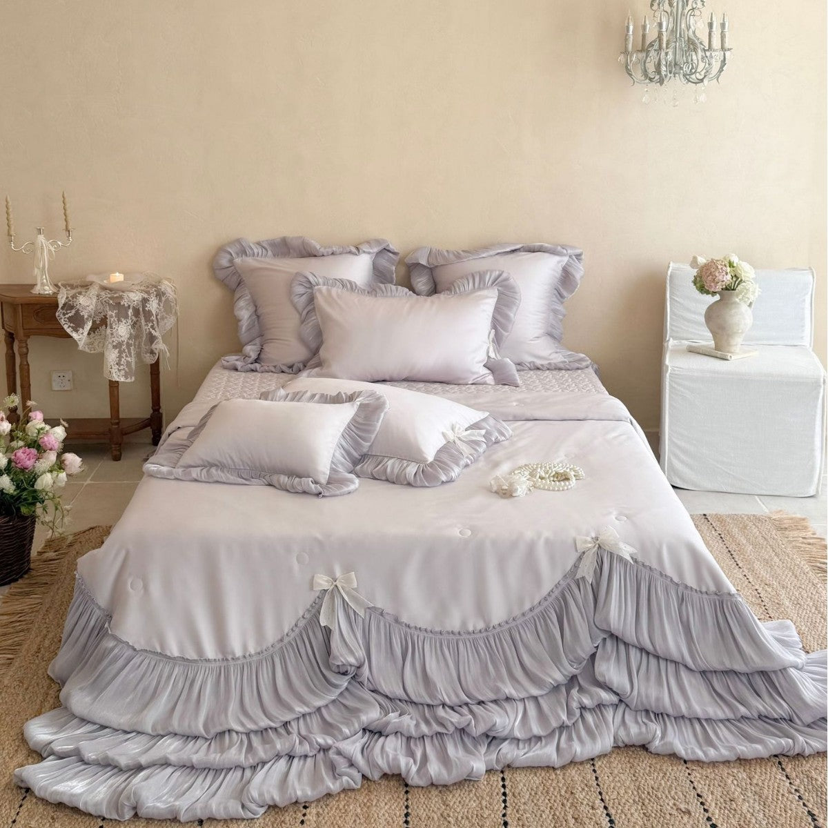 Romantic satin bedding and bedspread set with decorative ruffles and bows