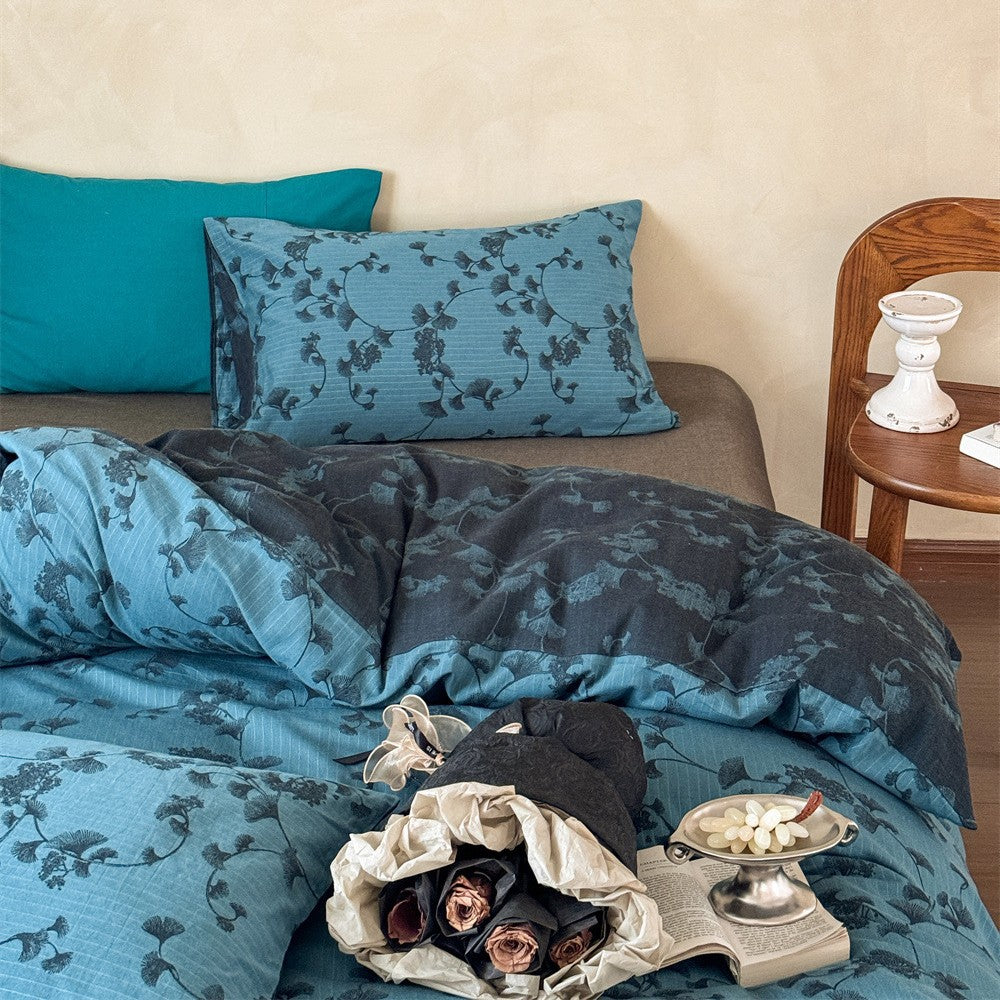 Premium cotton bedding set with floral all-over woven texture and light quilting