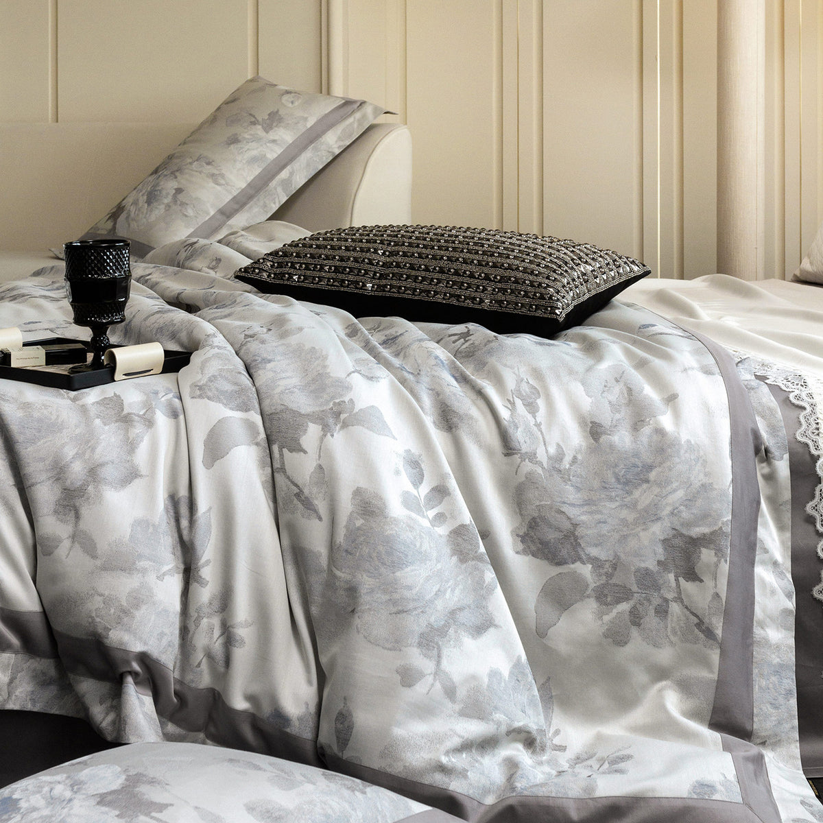 Cotton satin duvet cover set with delicate watercolor floral print, piped edge and matching pillowcases