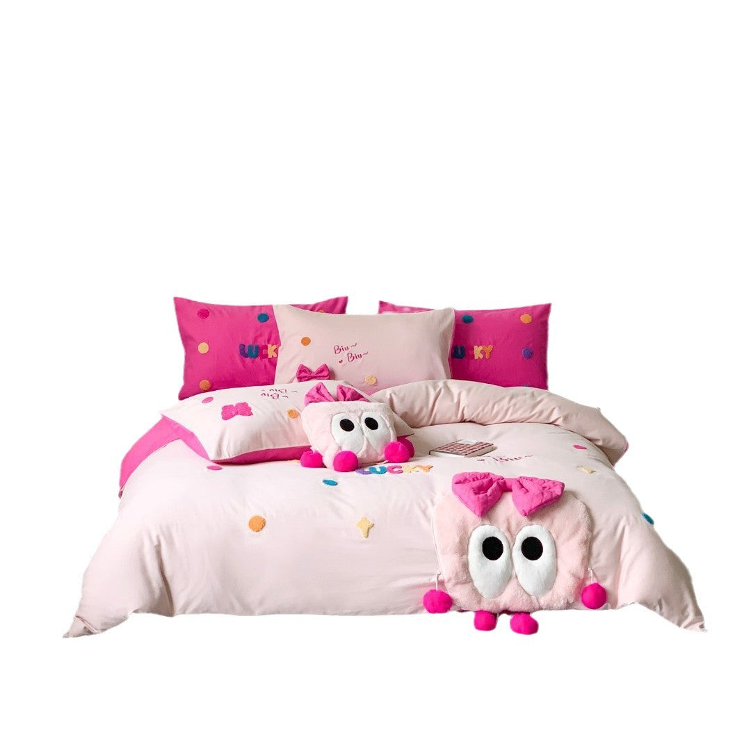 Playful cotton satin bed linen set with plush appliqué and reversible pillow